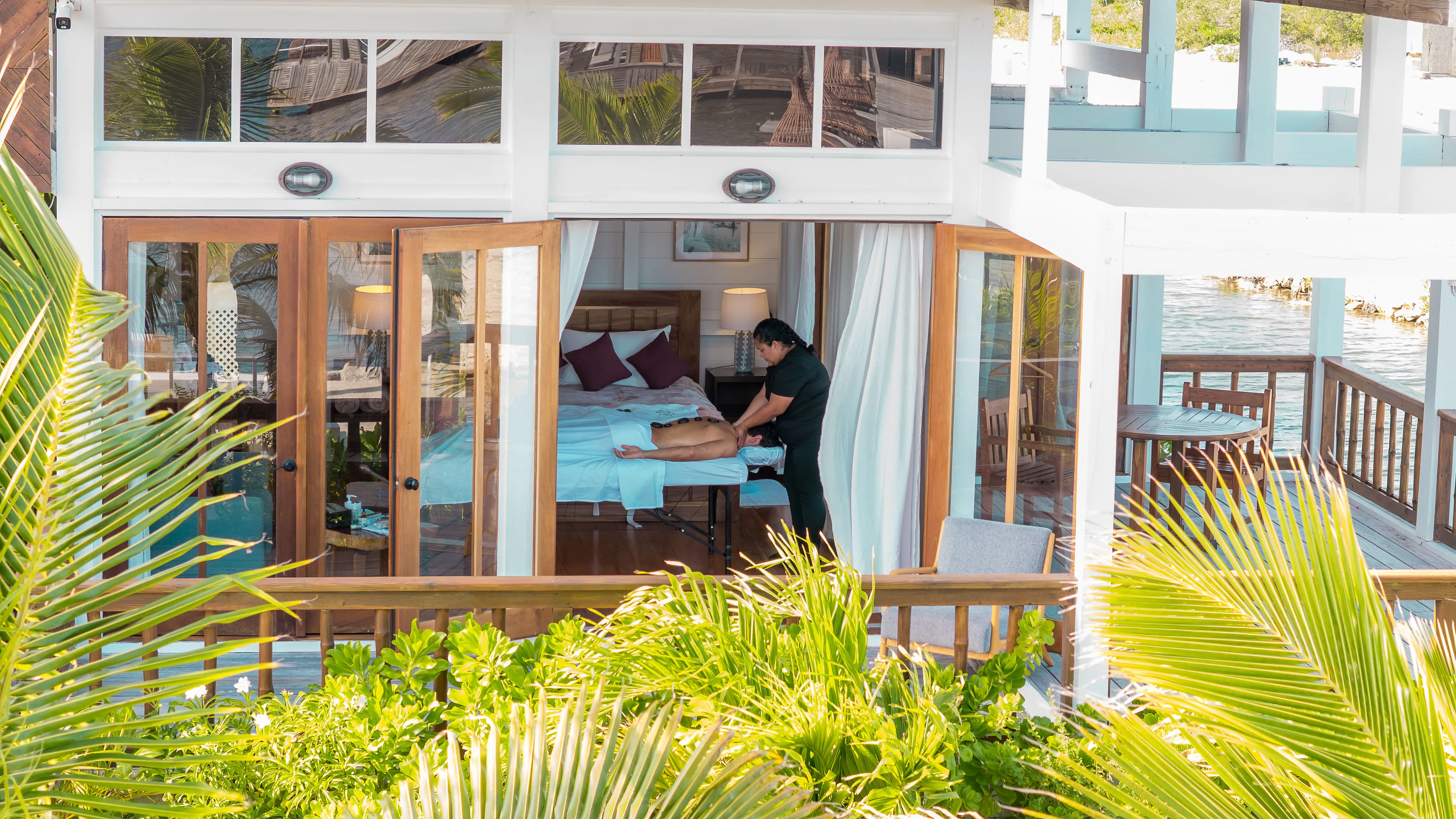 In-villa spa treatment with ocean view at Aruna Resort Ambergris Caye