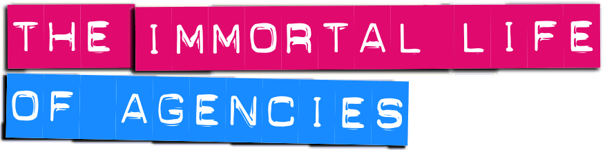 Text reading 'THE IMMORTAL LIFE OF AGENCIES' with the words 'THE IMMORTAL LIFE' in white on pink rectangular blocks and 'OF AGENCIES' in white on blue rectangular blocks.