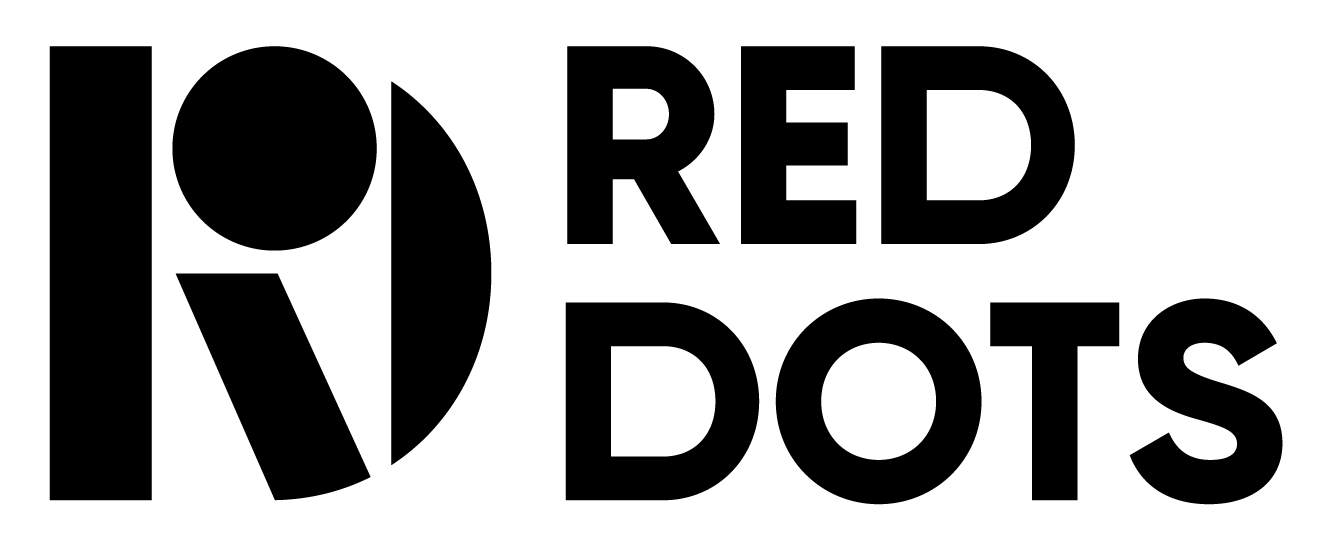 Black and white logo featuring a stylized letter R inside a circle, next to bold text reading 'RED DOTS'.