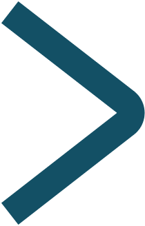 Dark teal right-pointing arrow symbol.