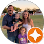 Hart Technologies Tucson IT support team member smiling with family at outdoor event