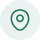 A simple green location pin icon on a light green background.