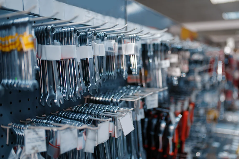 hardware hanging on shelves in store