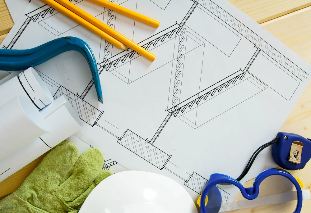 drafting papers on a desk