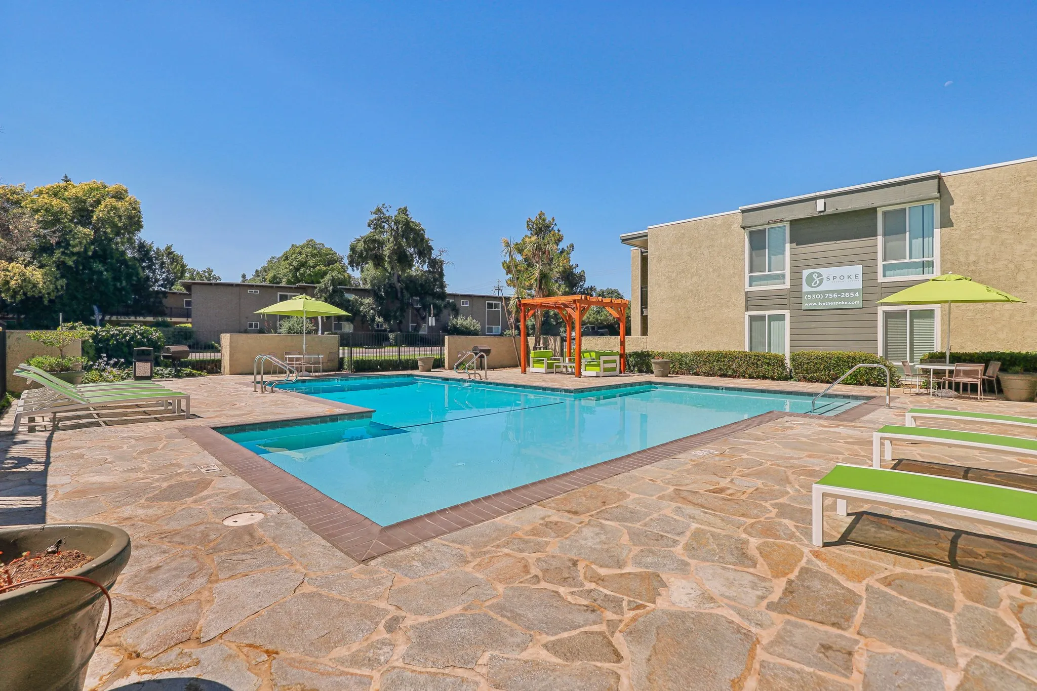 swimming pool with lounge chairs