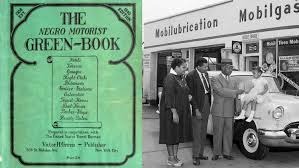 the green book and a black family stopping at a gas station 