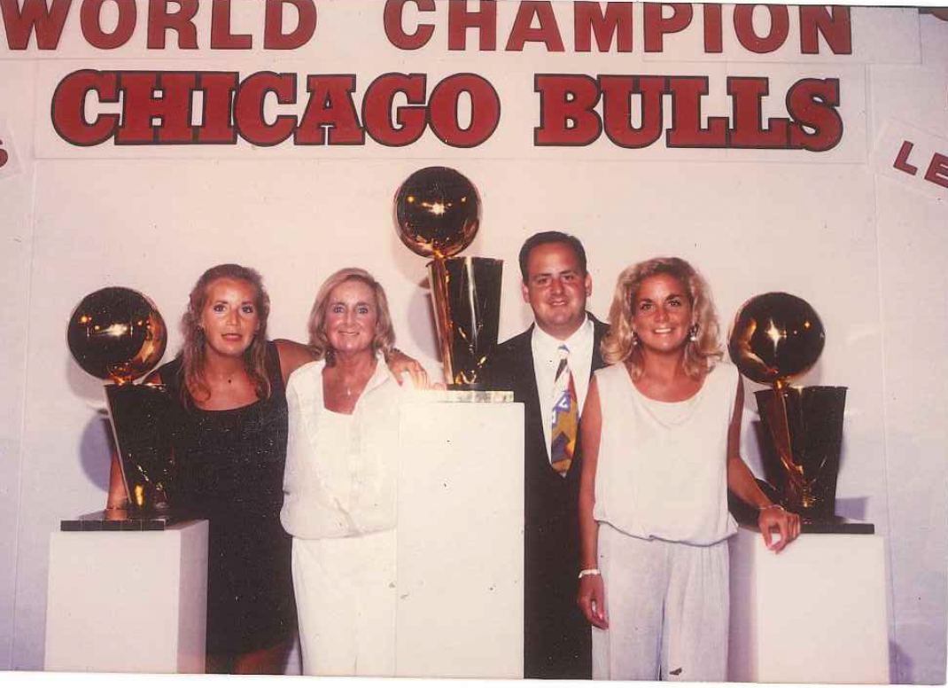 Carol Mickey Norton with the chicago bulls championship cups