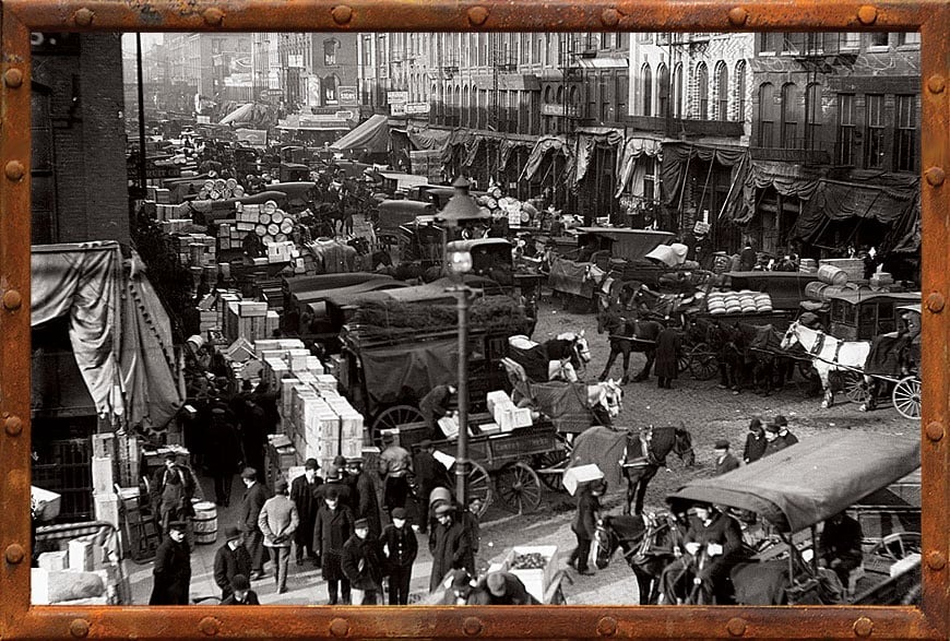 Water Street Market was a lively wholesale produce row along the Chicago River’s south waterfront. It grew up with the city and thrived – until city planners decided that its congestion and odors no longer belonged in the central business district. Photo Credit: Chicago History Museum