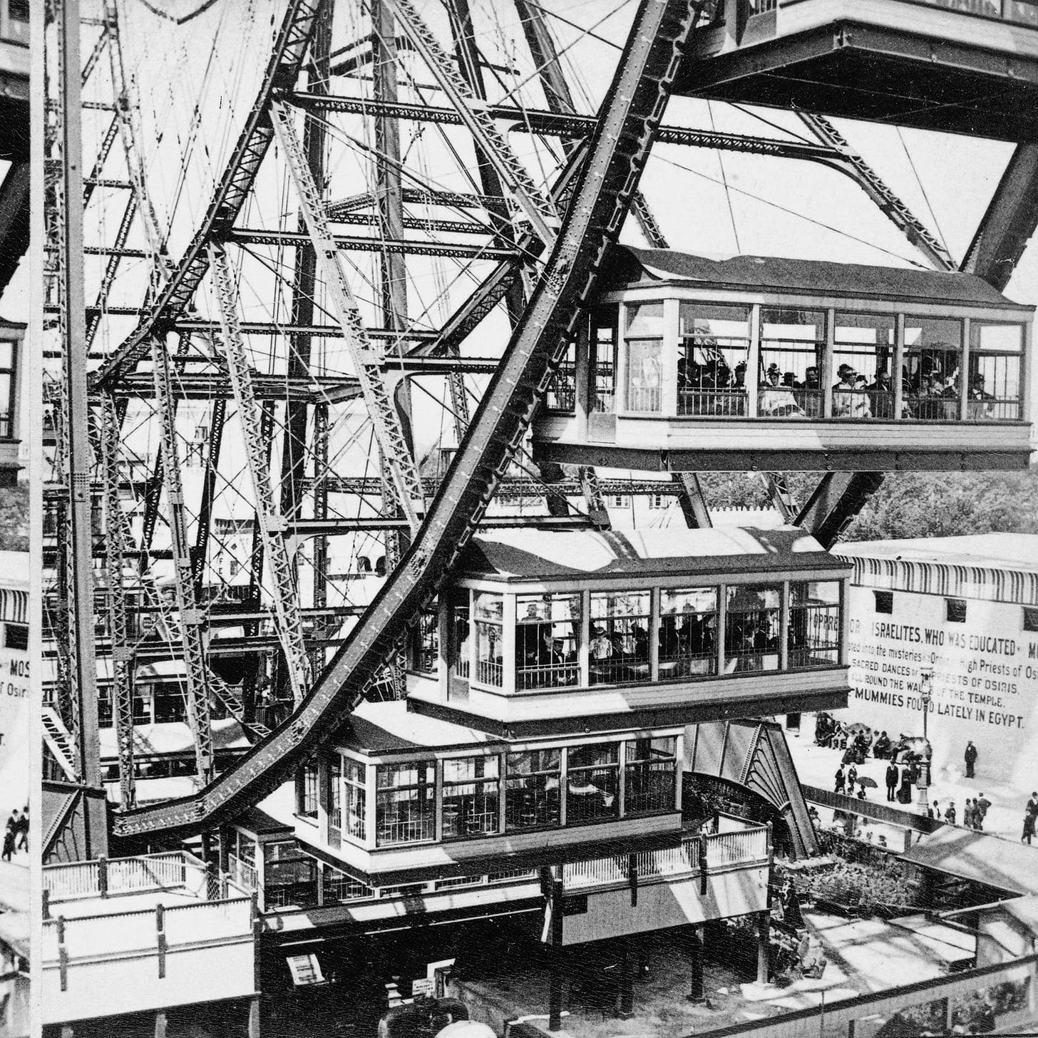 the ferris wheel cars at the midway plaisance of the world's fair 1893