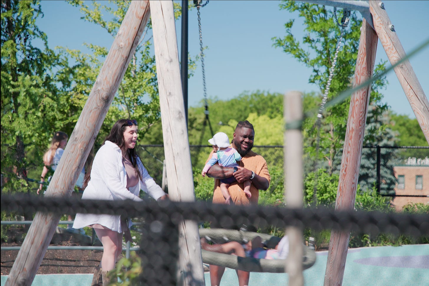 couple at the kids park at the obama presidential center on juneteenth in chicago