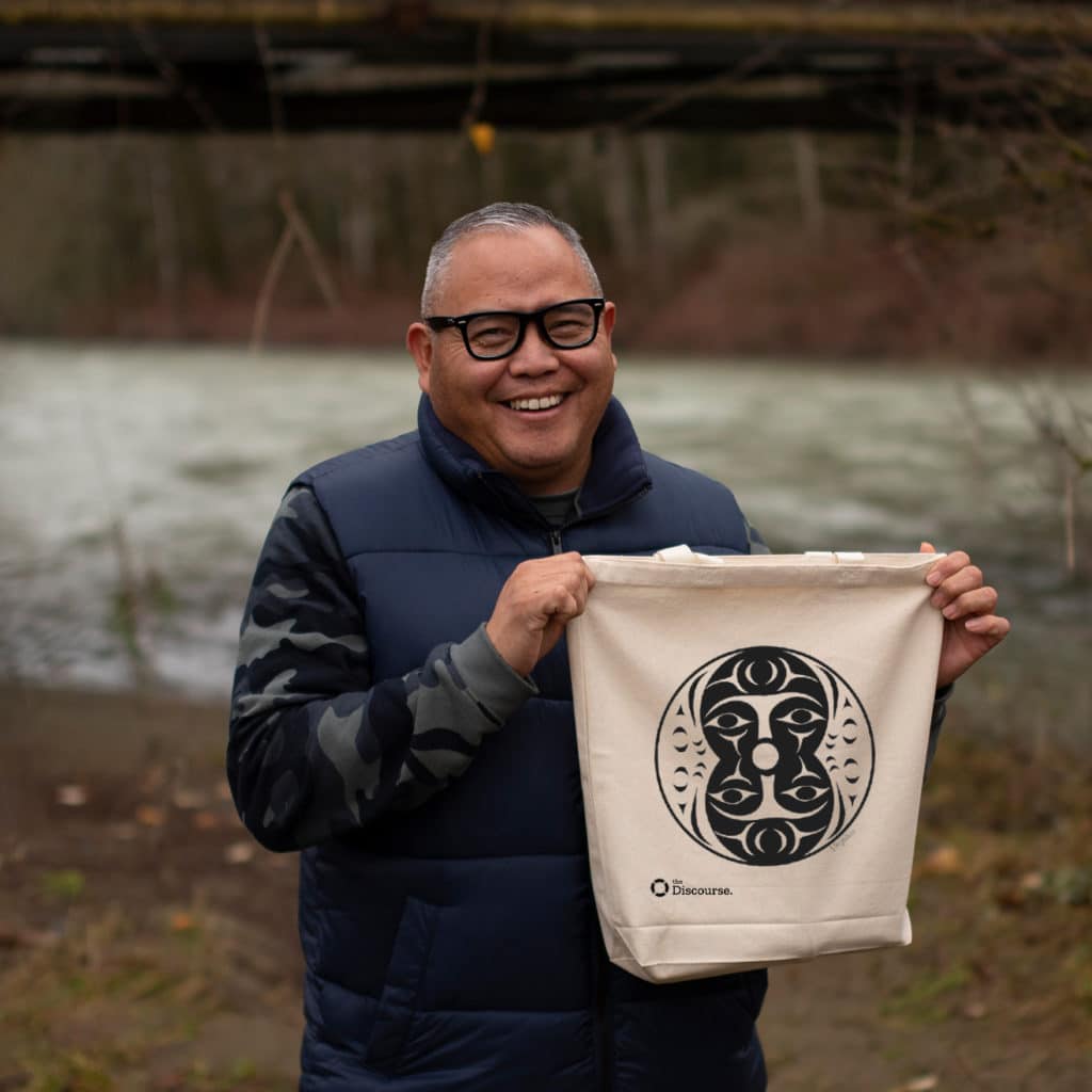 Company swag totebag designed  for The Discourse by the artist Stuart Pagaduan’s. The design shows two figures that share one mouth, surrounded by two protective eagle spirits. 