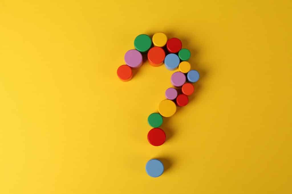 Colorful Building Blocks on Yellow Surface. What is Indiegraf.