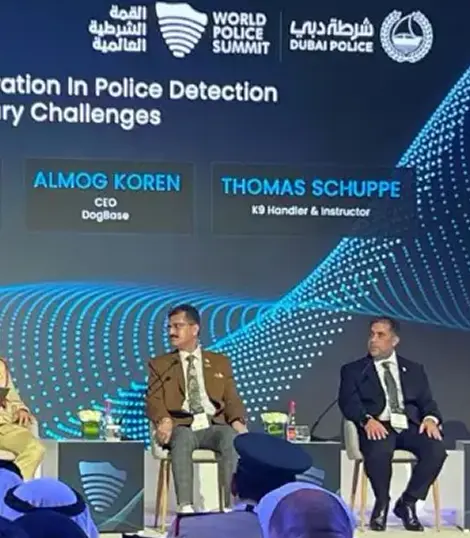 Panel discussion at the World Police Summit with speakers Almog Koren, CEO of DogBase, and Thomas Schuppe, K9 Handler and Instructor.
