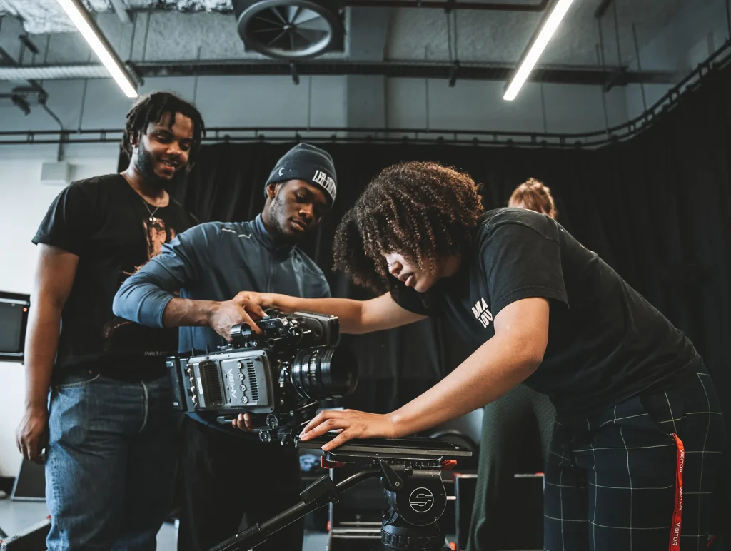 An image showing young people working on a camera at the London Screen Academy