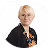 Blond woman with short hair wearing a black top with floral design, smiling at the camera.