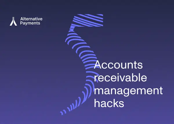 Accounts Receivable Management portrayed in an image of a office setting where there are people sitting in chairs on the outskirt of the photo and in the background. The foreground of the image is a desk with a notepad, pen cup holder, keyboard, mouse, and desktop apple computer. On the computer screen is the homepage for the Alternative Payments website where you can understand how best to choosing the right Payment Service Provider. The website in the image has the wording "Smooth payments for service-based businesses" set on a dark blue, navy, and purple color scheme. Above the computer is a window with light beaming through from the sun outside.