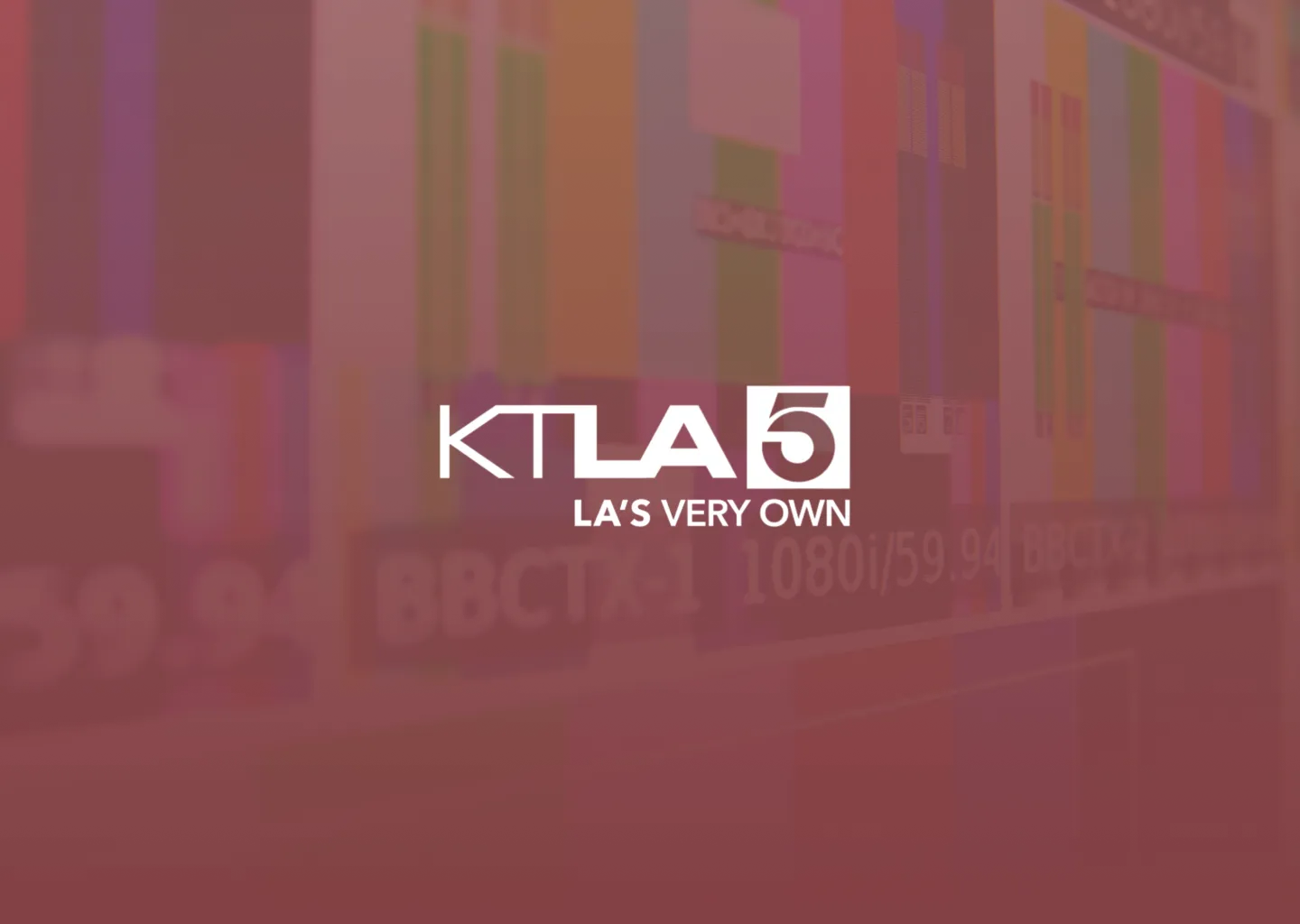 KTLA 5 logo over a red-tinted television newsroom background