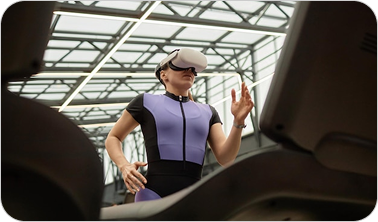 Woman wearing VR headset exercising indoors near treadmill under skylight ceiling.