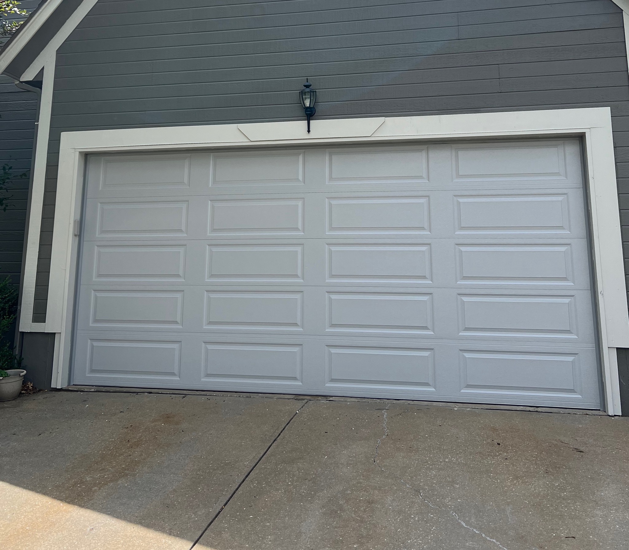 Close up of a DoorLink 3650 in gray. All framing painted showing a successful re-frame.