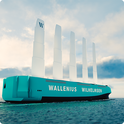 Eco-friendly Wallenius Wilhelmsen cargo ship sailing with five large white sails on calm sea.