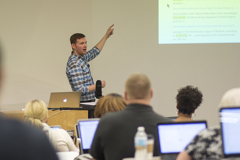 DTS professor teaching a group of students