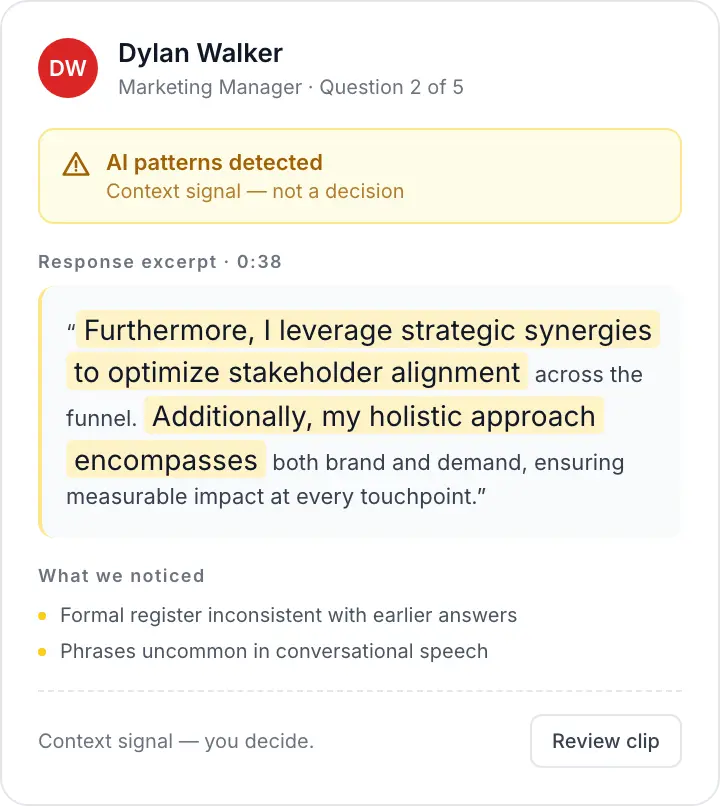 AI Check flagging patterns of AI-assisted language in a candidate response with highlighted phrases and contextual explanation.