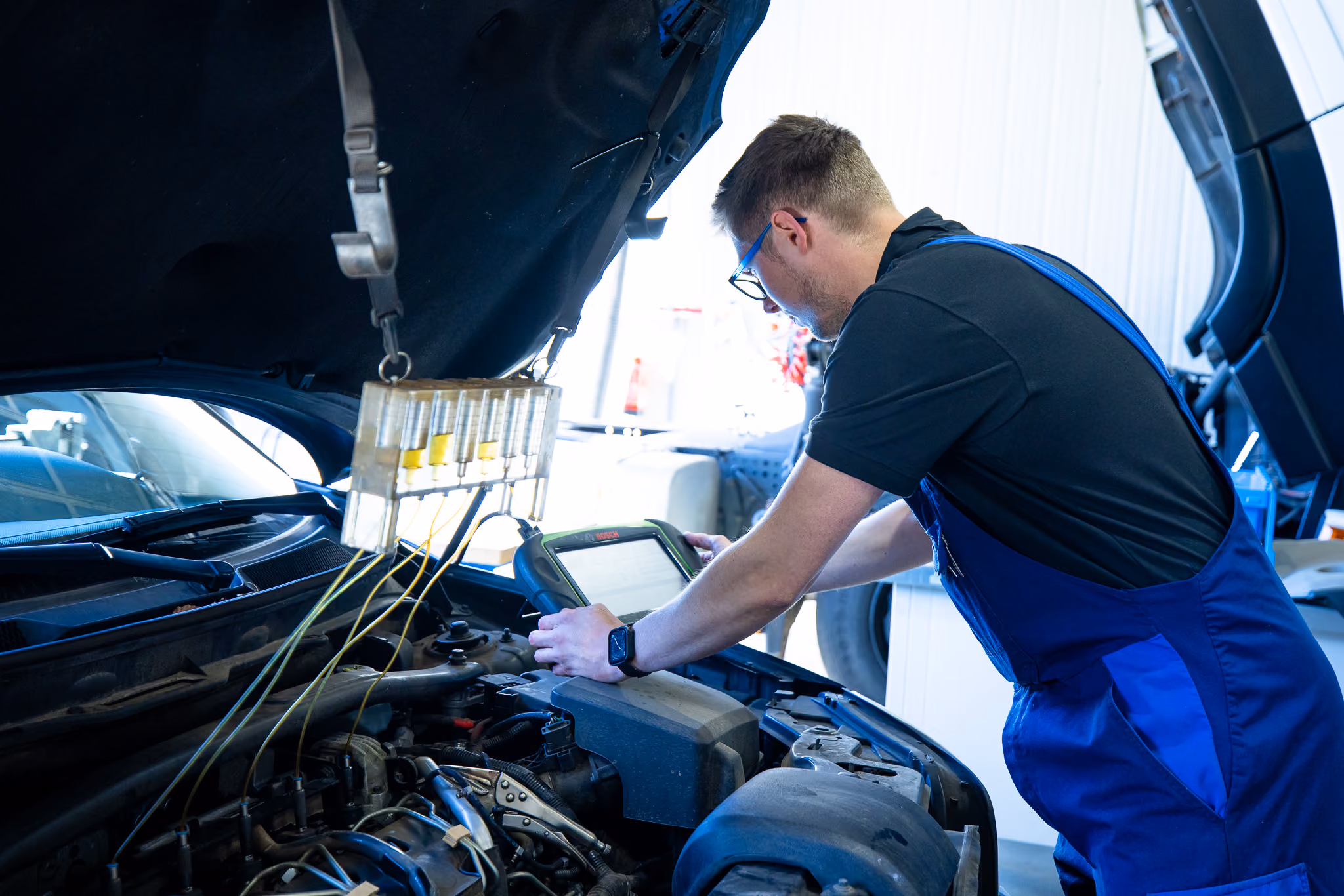 [background image] image of auto parts (for an automotive service)