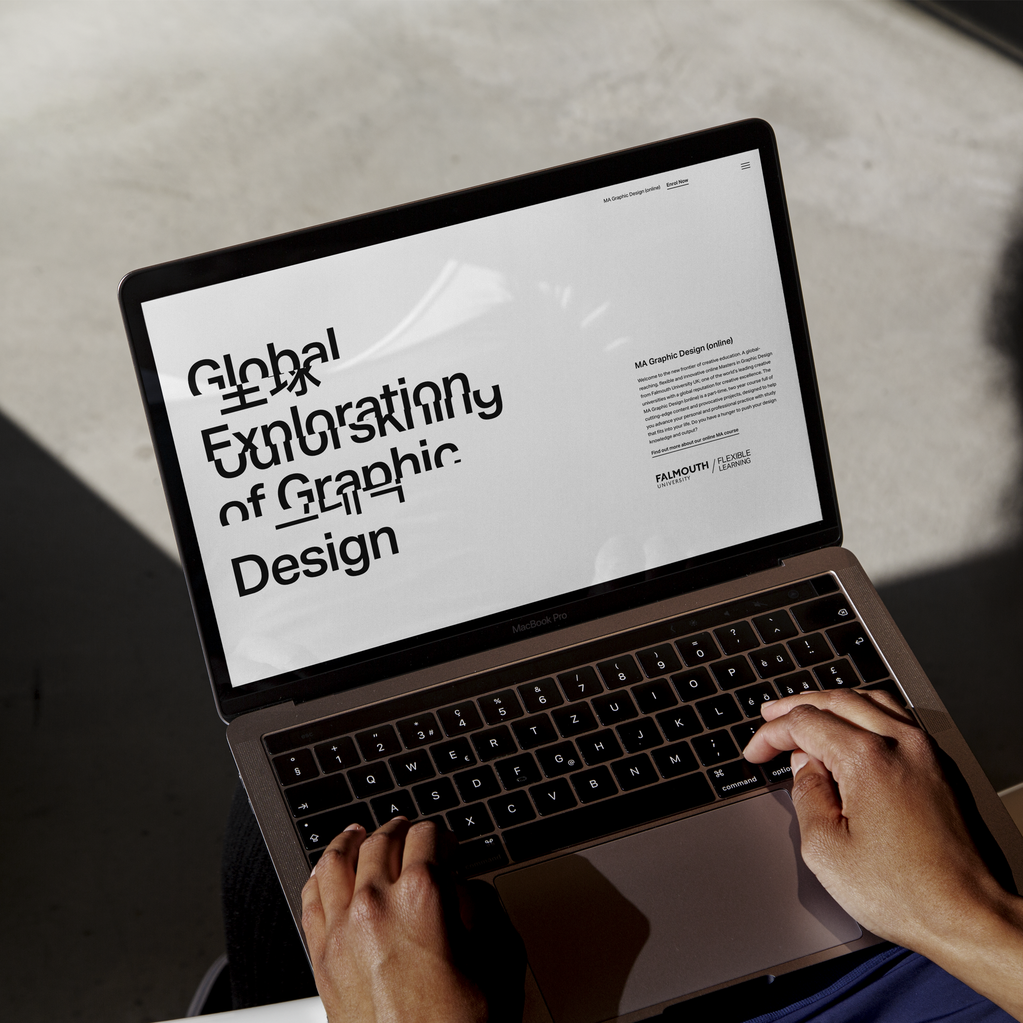 The typographic identity pairs two languages, chosen to represent the nationalities of the global student cohort.