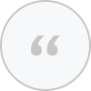 Gray quotation marks inside a white circle with a light gray border.