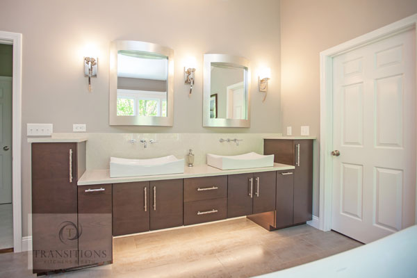 bathroom design with large vanity cabinet