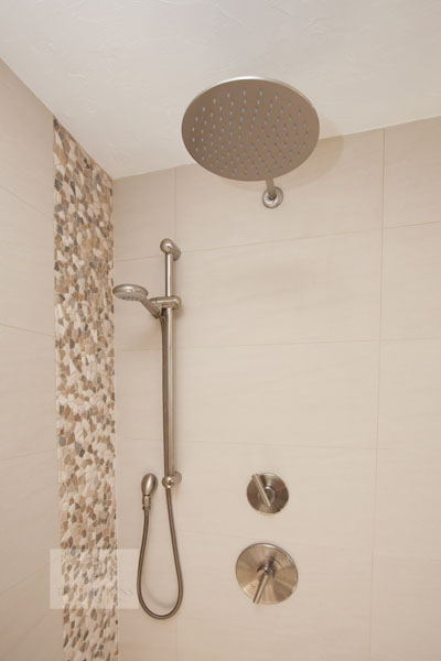 Shower design with multiple showerheads