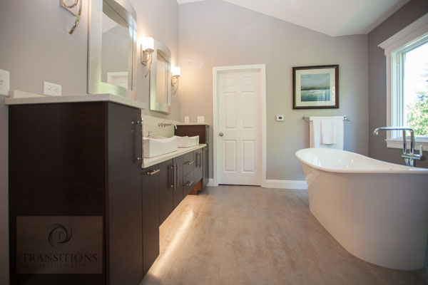 Contemporary Marshfield bathroom with a Victoria and Albert Toulouse freestanding tub and cherry espresso vanity