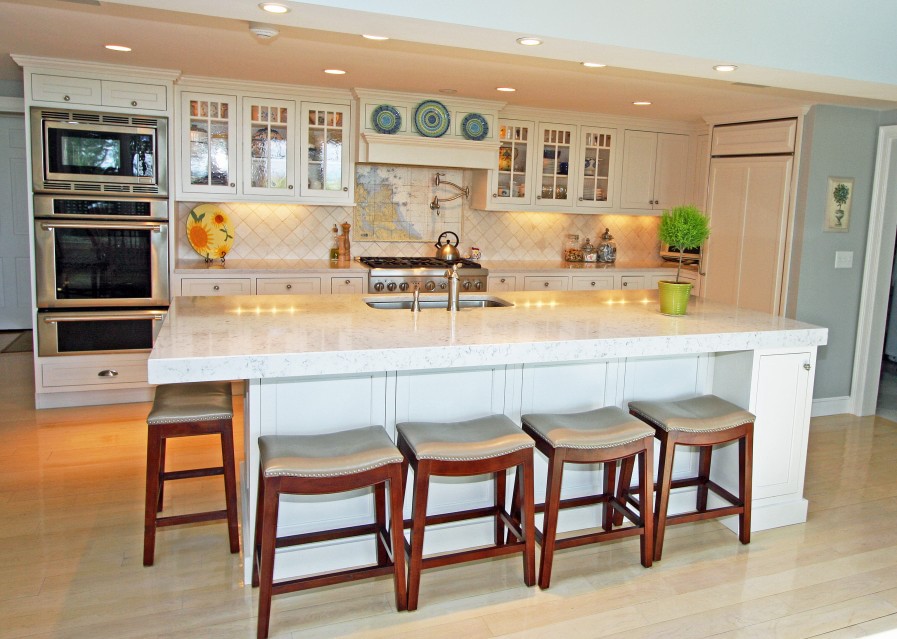 Cohasset kitchen remodel with a built-in desk area and dry bar by Transitions