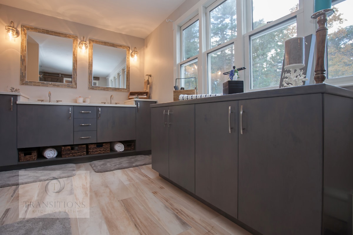 Sliding barn door connecting the Norwell primary bath to the walk-in closet