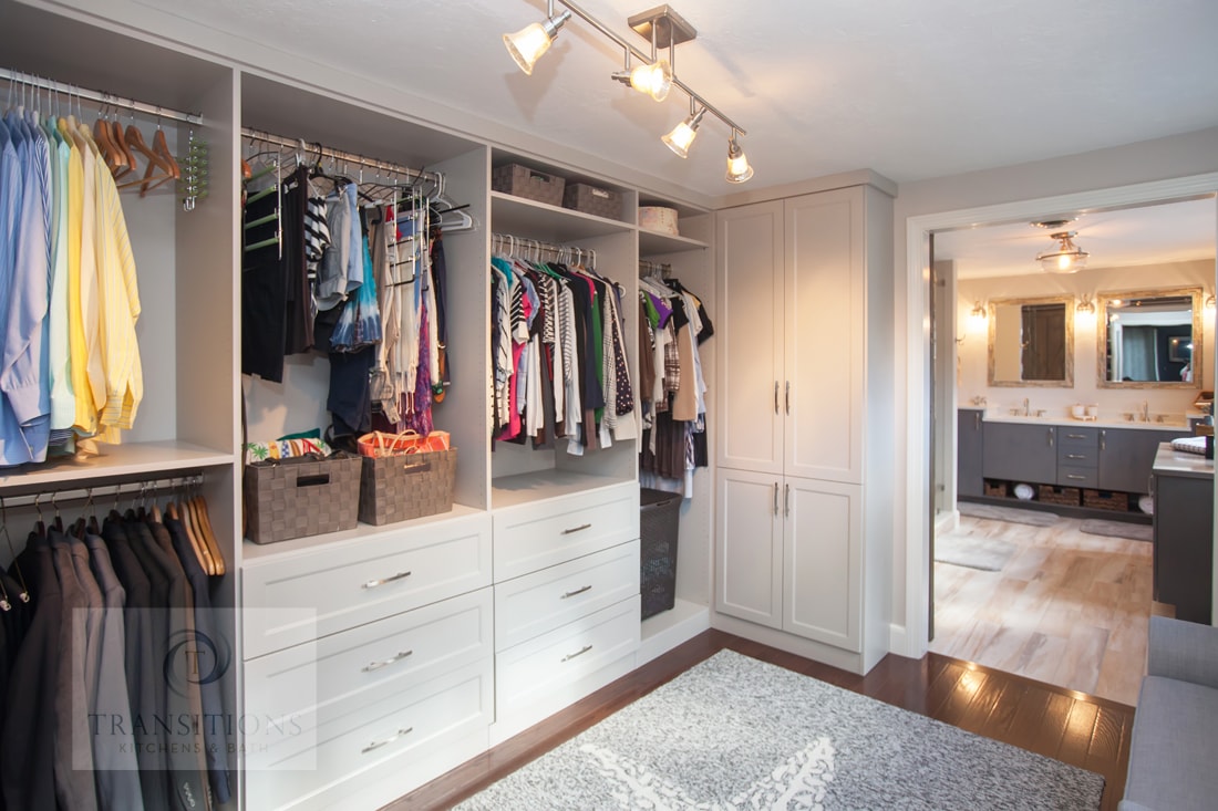 Hanging storage and closed cabinetry in the contemporary closet