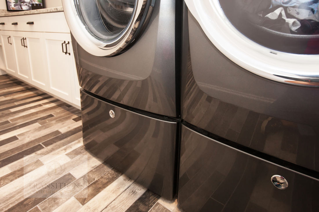 Detail of Masterbrand Diamond Vibe cabinetry in the Norwell laundry room