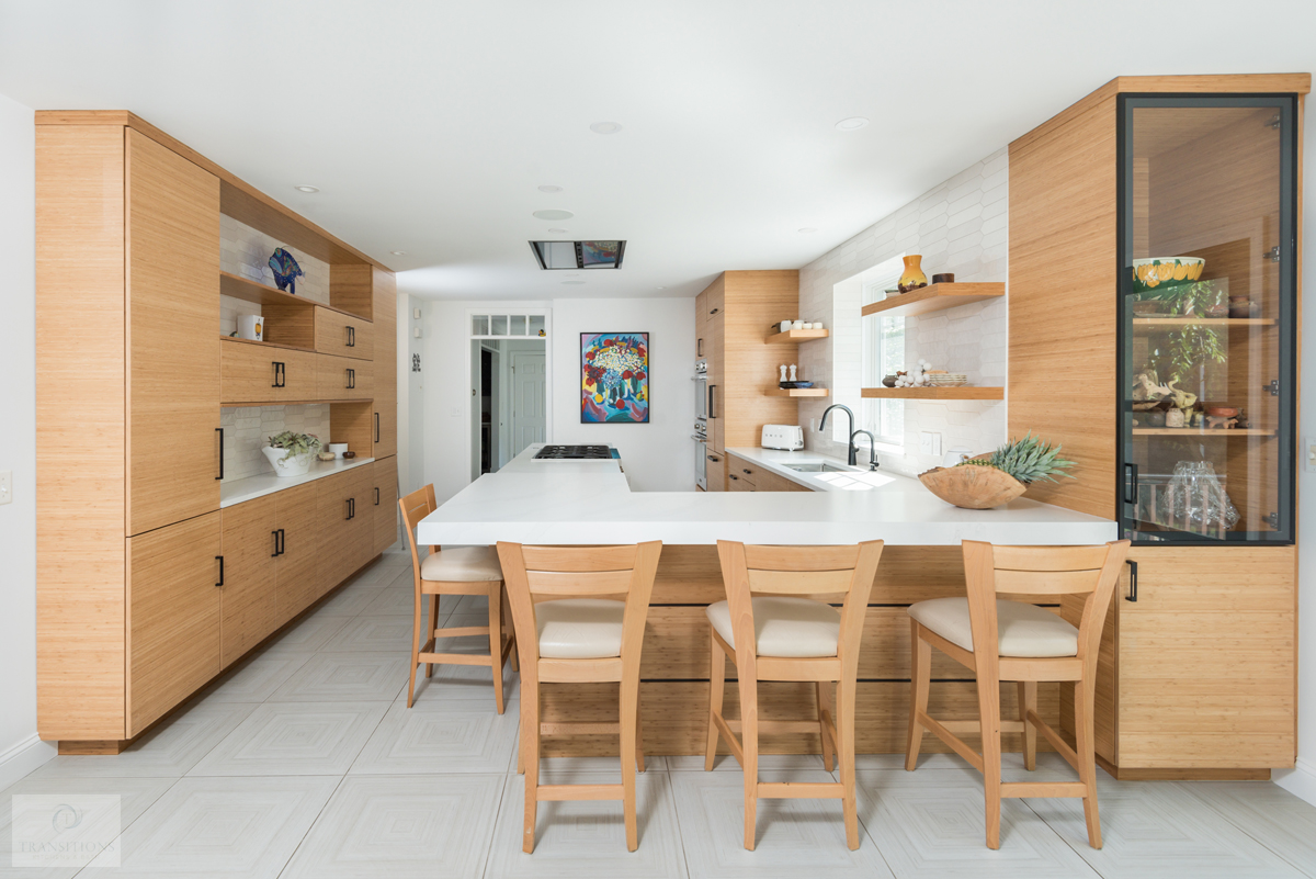 View from the kitchen into the adjacent dining and living areas