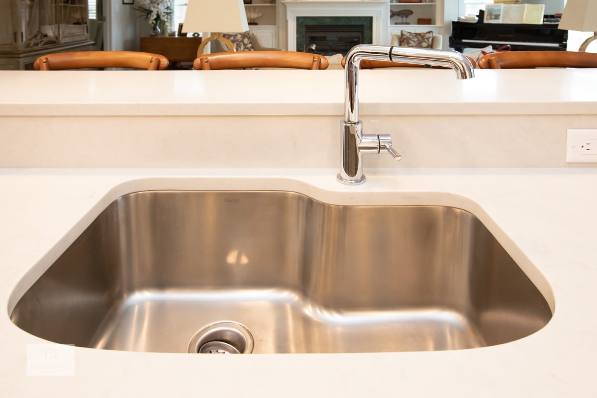 Custom hood and island detail in the Cohasset transitional kitchen