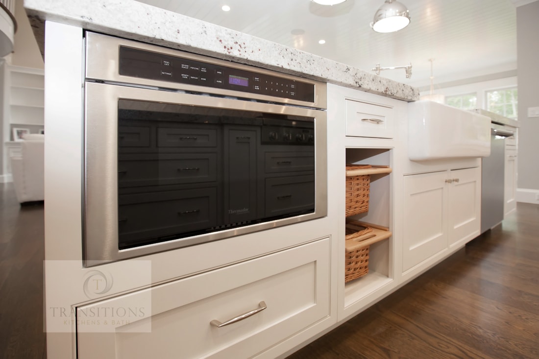 Wide view of the Norwell kitchen showing the open layout