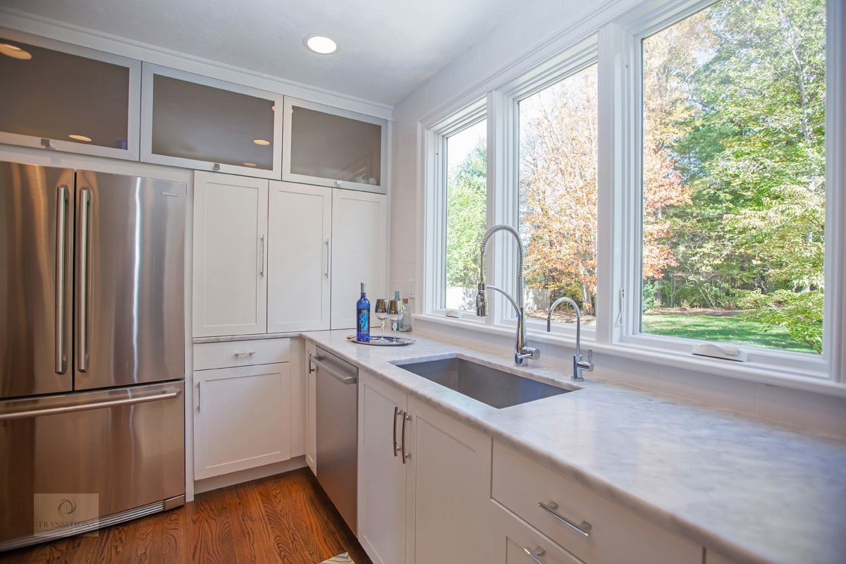 Sleek white Tedd Wood cabinetry detail in the Marshfield contemporary kitchen
