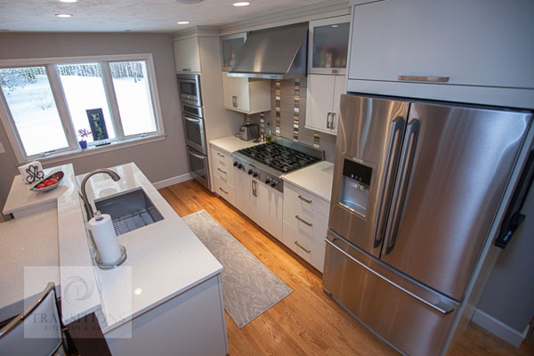 Casual seating leg of the T-shaped island in the Hanover kitchen
