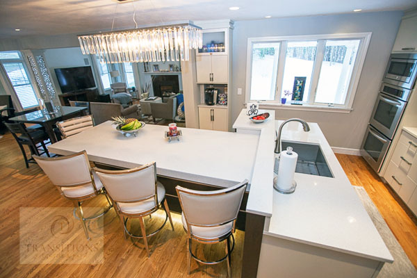 Glass-front upper cabinets in the contemporary Hanover kitchen