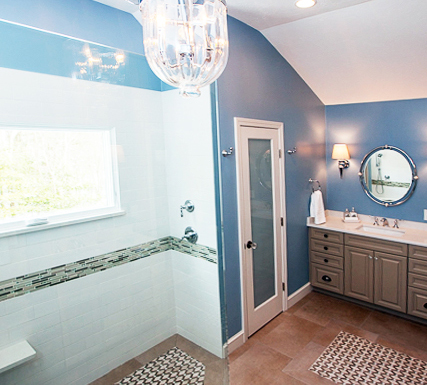 Wide view of the primary bath showing both vanity walls