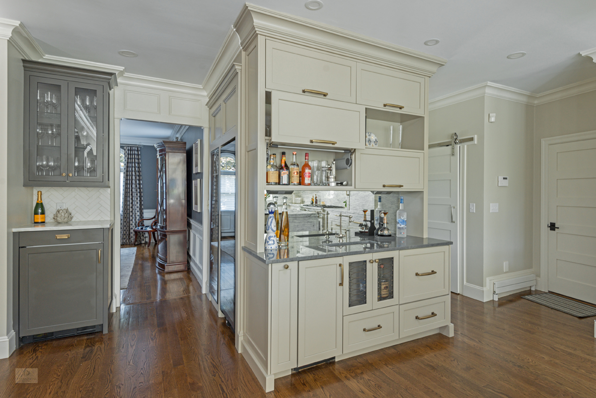 Gray island contrasting with the white perimeter in the Milton kitchen