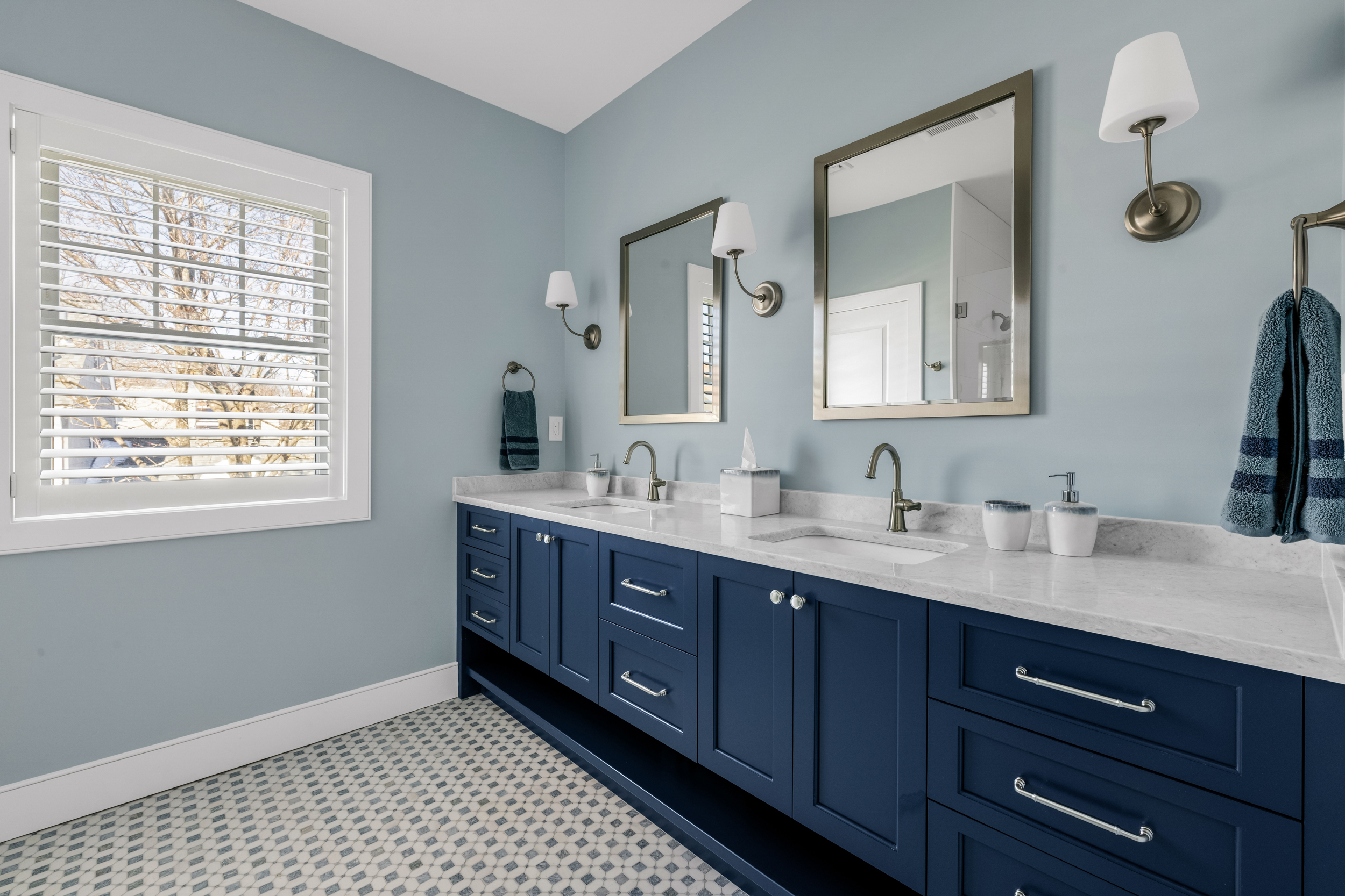 Patterned floor tile and Naval double vanity in the Milton primary bath