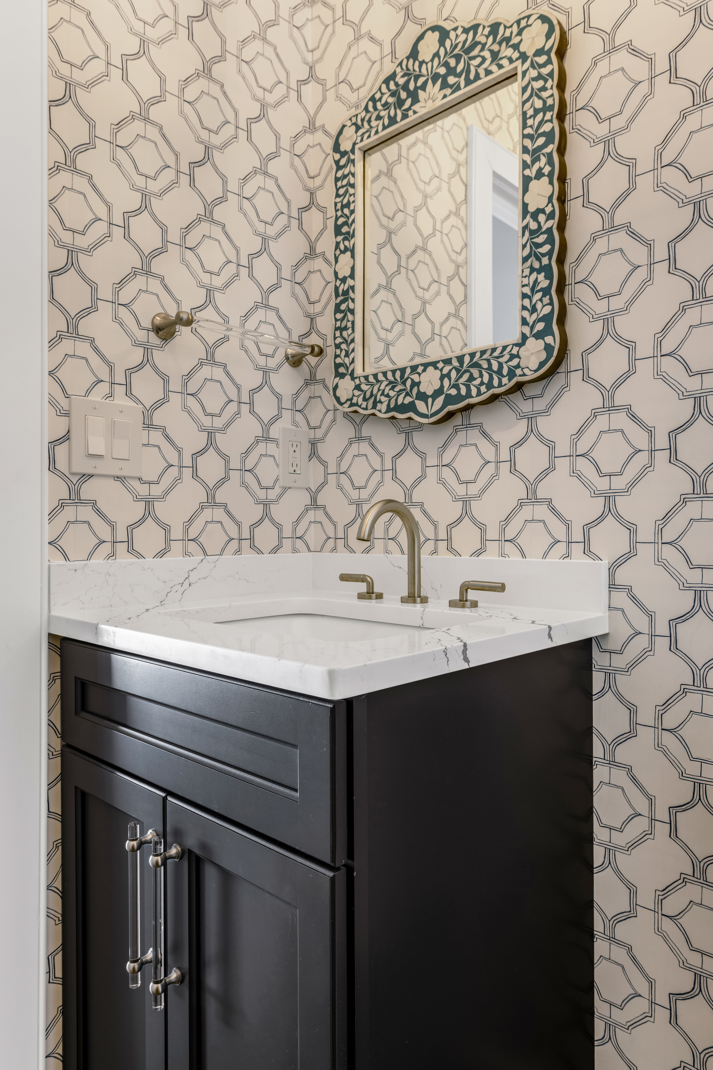 Hall bathroom with Diamond Farrah White vanity and Daltile Hex Pecan floor tile