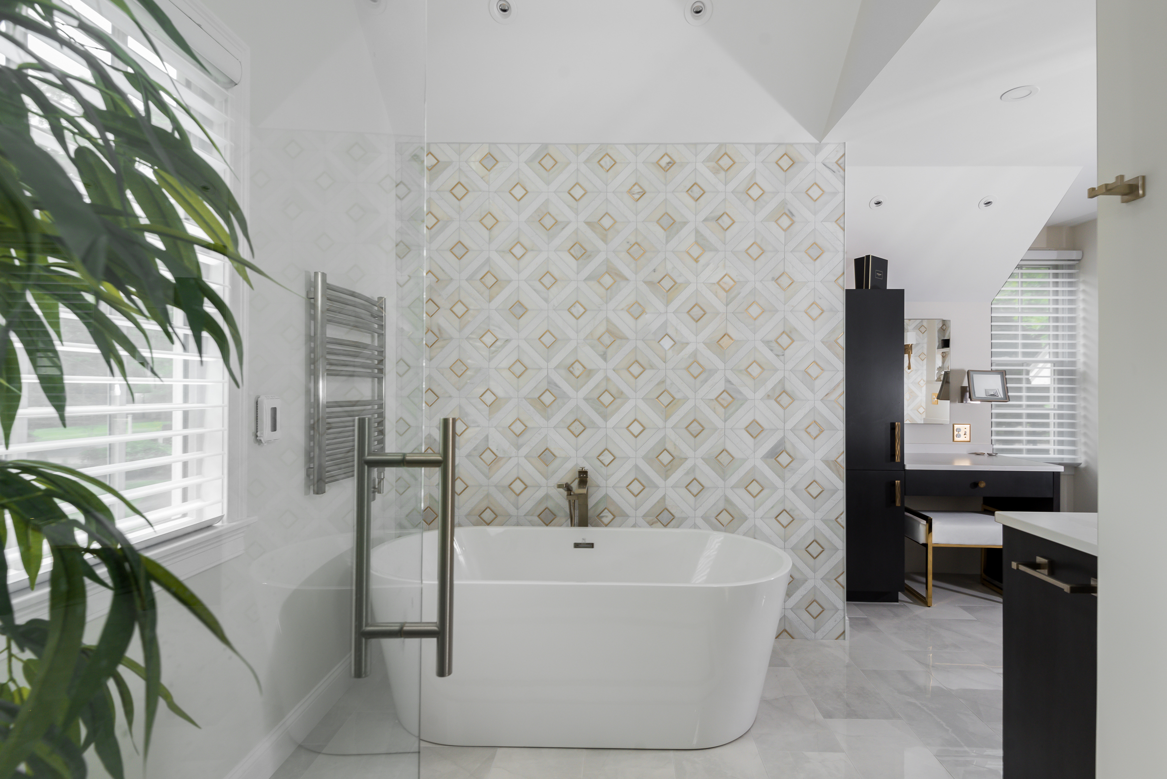 Marble and brushed gold metal geometric tile feature wall detail