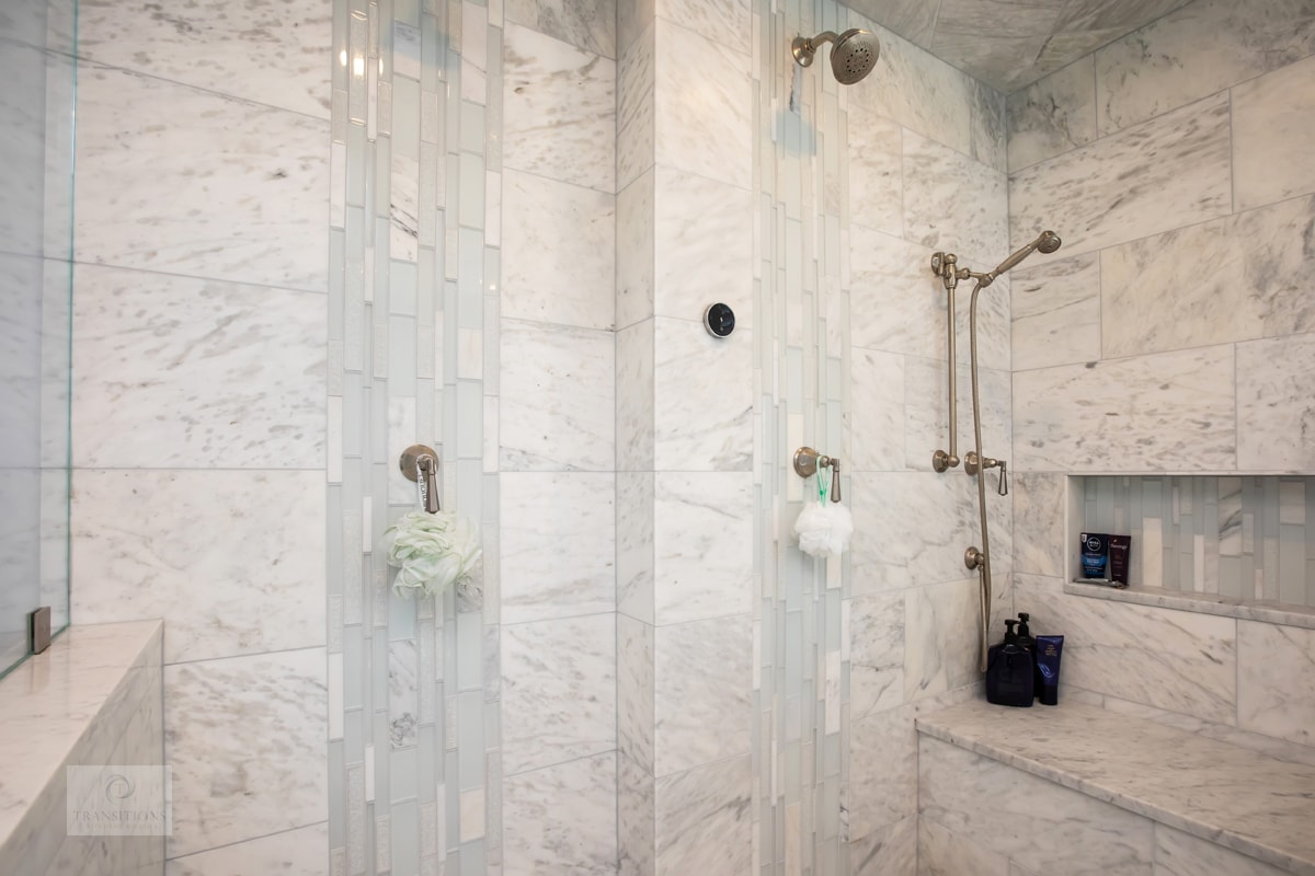 Shower with large-format tile in a Massachusetts bathroom remodel