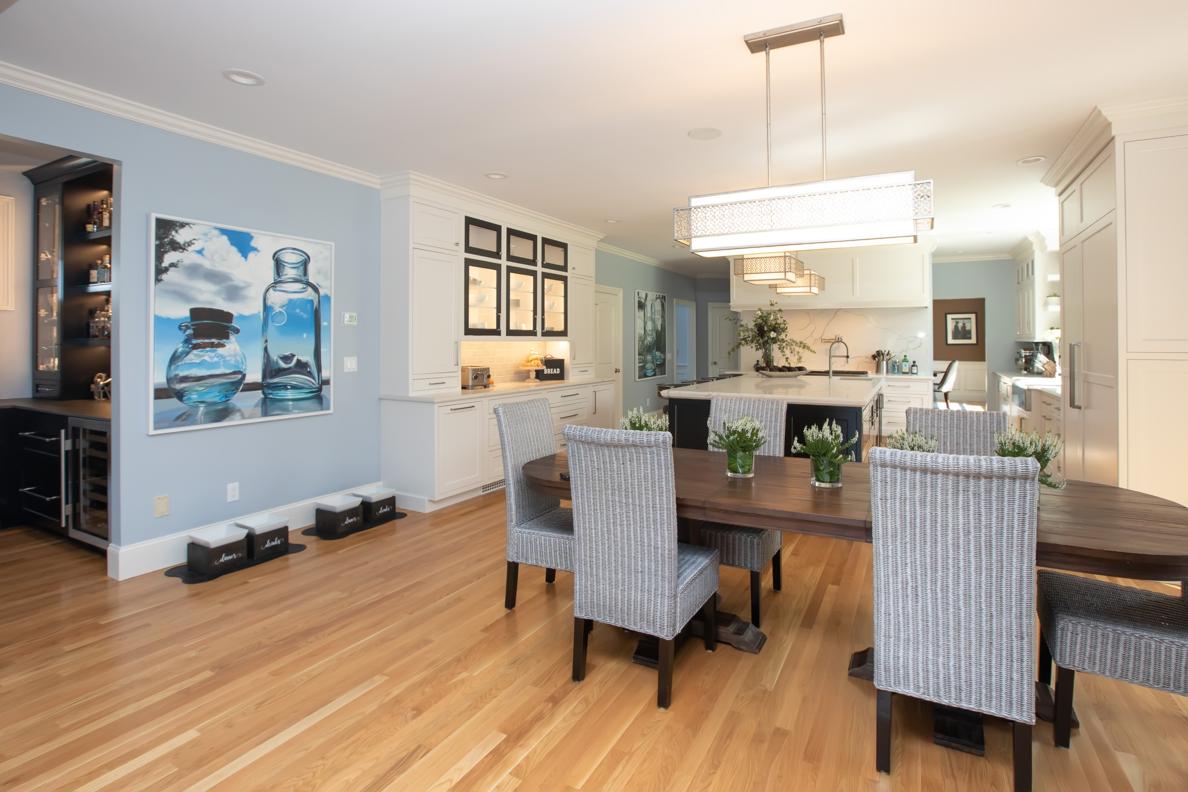Dining area with Feiss Kenney Collection pendant beside the Hingham kitchen