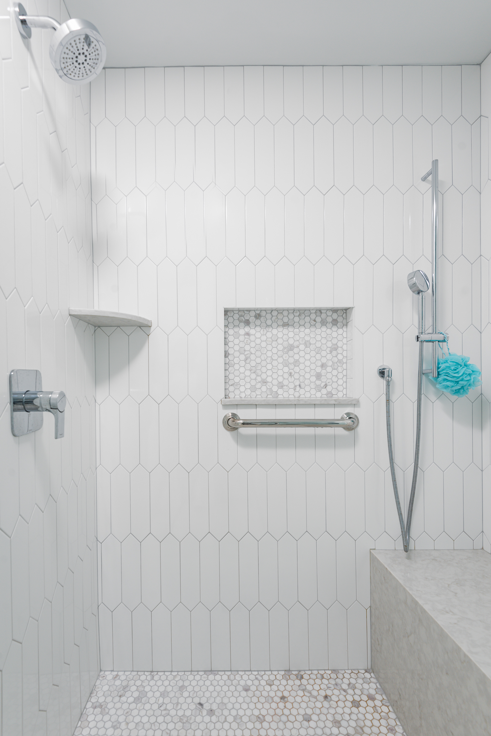 Walk-in shower view from the vanity in the Hingham coastal primary bath